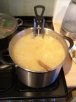 Marmalade boiling with sugar in it